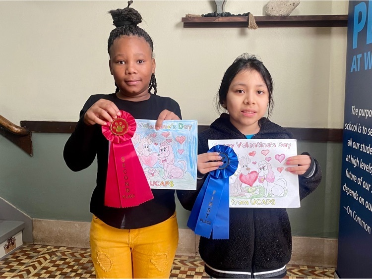 students holding ribbons