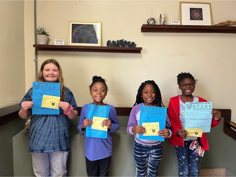 students holding certificates